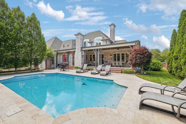 114 Middleton Cir, Nashville, TN 37215 - back of house featuring a patio area, a chimney, ceiling fan, and brick siding