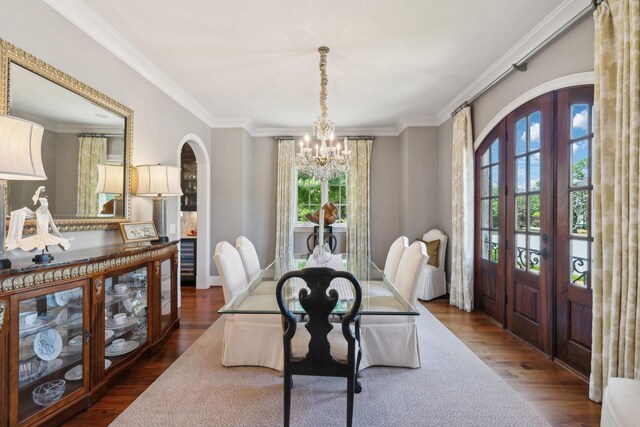 114 Middleton Cir, Nashville, TN 37215 - dining area with french doors, a chandelier, arched walkways, wood finished floors, and crown molding