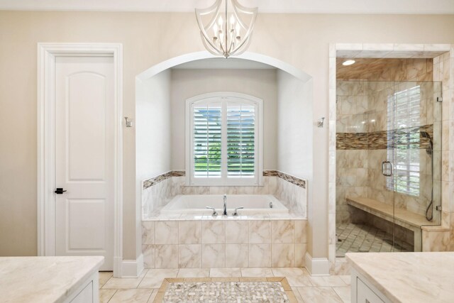 114 Middleton Cir, Nashville, TN 37215 - bathroom with a garden tub, a shower stall, a chandelier, and vanity