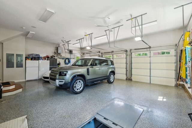 114 Middleton Cir, Nashville, TN 37215 - garage with a garage door opener and freestanding refrigerator