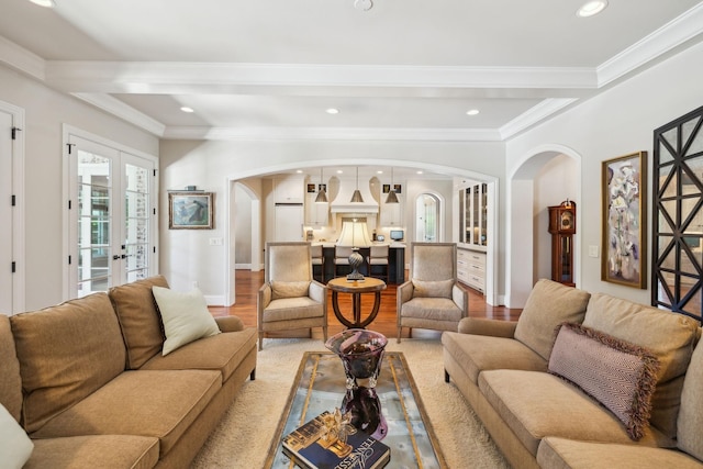 114 Middleton Cir, Nashville, TN 37215 - living room featuring arched walkways, light wood finished floors, recessed lighting, and ornamental molding