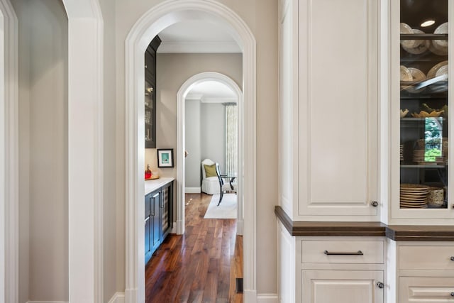 114 Middleton Cir, Nashville, TN 37215 - hall with dark wood finished floors, arched walkways, and crown molding