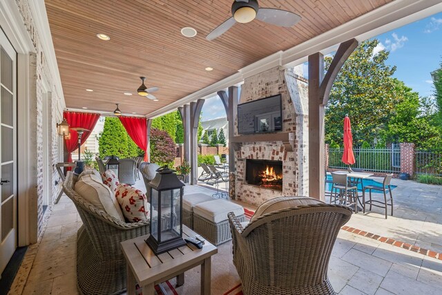 114 Middleton Cir, Nashville, TN 37215 - view of patio with a ceiling fan, an outdoor living space with a fireplace, and outdoor dining area