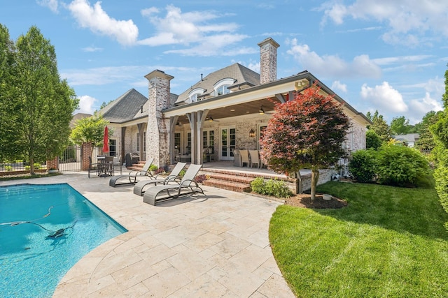 114 Middleton Cir, Nashville, TN 37215 - back of house featuring a patio, french doors, an outdoor pool, a chimney, and a ceiling fan