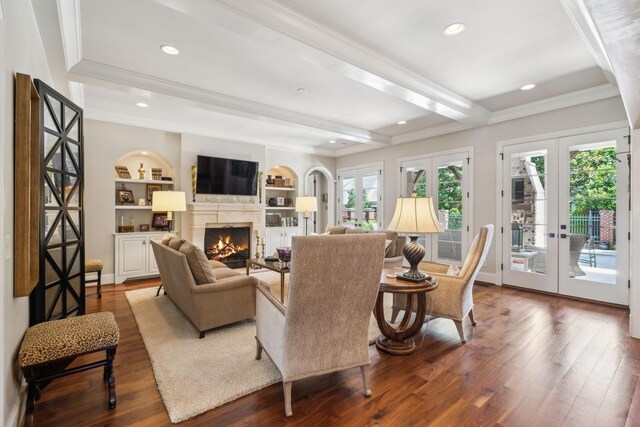 114 Middleton Cir, Nashville, TN 37215 - living room featuring french doors, ornamental molding, dark wood-style flooring, a lit fireplace, and beam ceiling