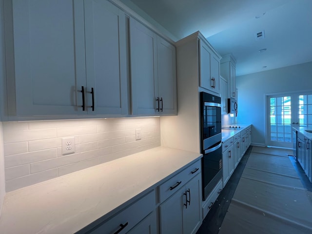 1720 Merkel Rd, Columbia, TN 38401 - kitchen featuring black appliances, backsplash, and dark wood-type flooring