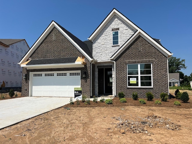 1720 Merkel Rd, Columbia, TN 38401 - traditional-style home featuring brick siding, a garage, and driveway