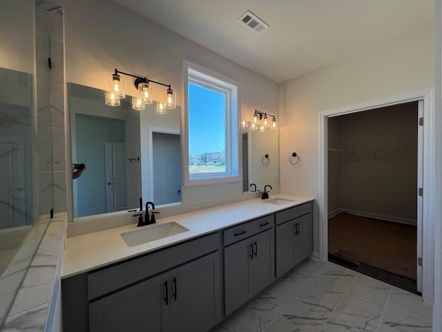 1720 Merkel Rd, Columbia, TN 38401 - full bath with double vanity, a walk in closet, marble look tile flooring, and a shower