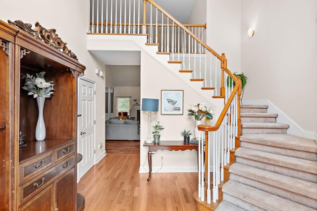 604 Applejack Ct, Antioch, TN 37013 - foyer entrance with light wood-style floors, stairway, and a high ceiling