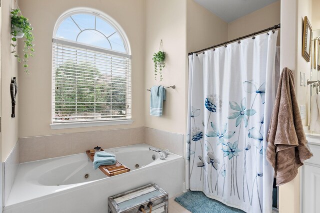 604 Applejack Ct, Antioch, TN 37013 - full bath featuring a tub with jets and a shower with shower curtain