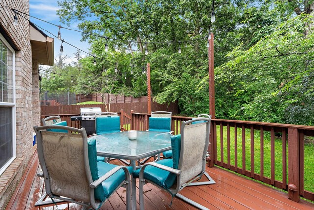 604 Applejack Ct, Antioch, TN 37013 - wooden terrace with outdoor dining area and area for grilling