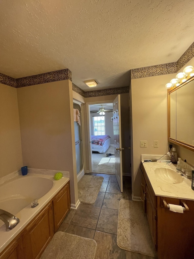 1021 Maple Grove Rd, Lafayette, TN 37083 - ensuite bathroom with a bath, vanity, a textured ceiling, and a shower with shower door