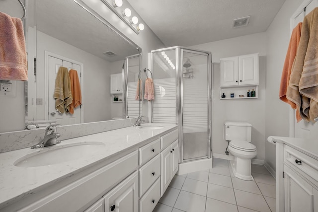 1013 Laurel Hills Dr, Dickson, TN 37055 - bathroom with double vanity, a shower stall, and tile patterned flooring