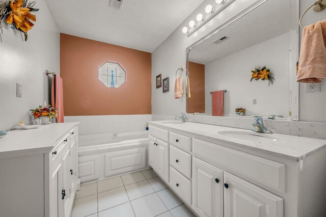 1013 Laurel Hills Dr, Dickson, TN 37055 - bathroom featuring double vanity, tile patterned floors, and a bath