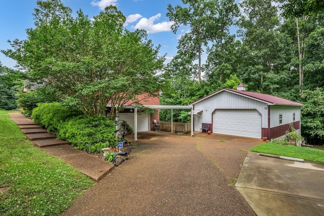 1013 Laurel Hills Dr, Dickson, TN 37055 - view of front of property with a garage and an outbuilding