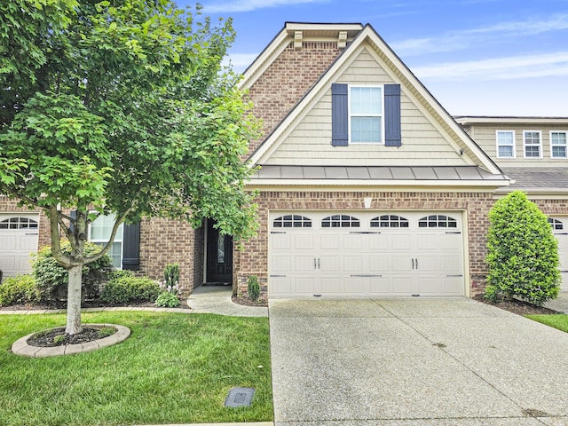 835 Meadowcrest Way, Lebanon, TN 37090 - view of front of home with concrete driveway, brick siding, and a front lawn