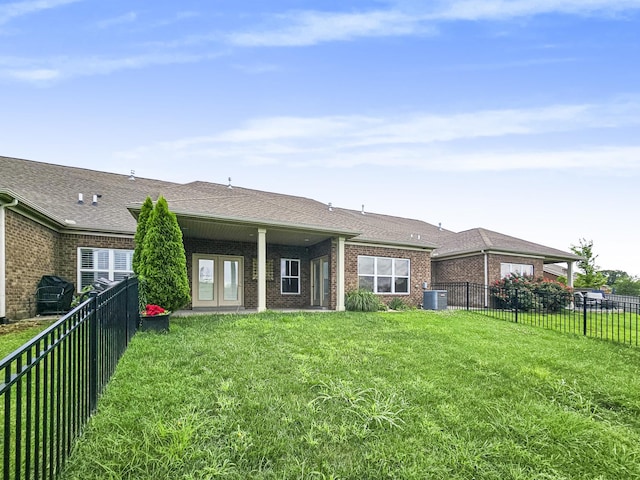 835 Meadowcrest Way, Lebanon, TN 37090 - rear view of property featuring brick siding, a fenced backyard, and a shingled roof
