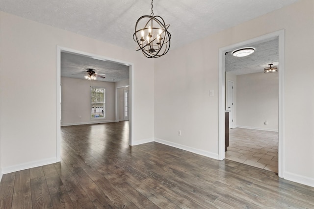 989 Ernest Stewart Dr, Clarksville, TN 37042 - unfurnished room featuring a textured ceiling, a chandelier, wood finished floors, and a ceiling fan