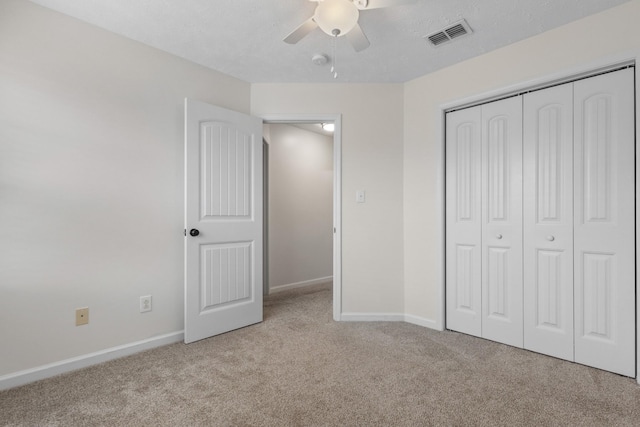 989 Ernest Stewart Dr, Clarksville, TN 37042 - unfurnished bedroom featuring carpet flooring, a closet, and ceiling fan