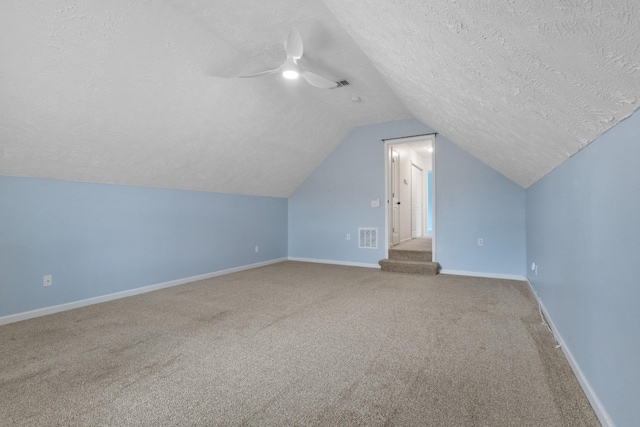 989 Ernest Stewart Dr, Clarksville, TN 37042 - bonus room featuring a textured ceiling, carpet floors, vaulted ceiling, and ceiling fan