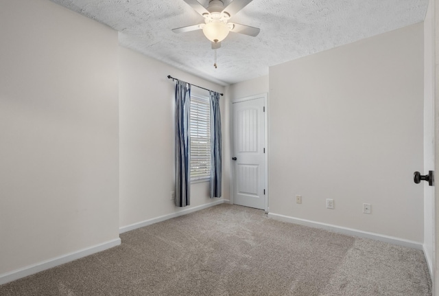 989 Ernest Stewart Dr, Clarksville, TN 37042 - spare room with carpet, a textured ceiling, and ceiling fan