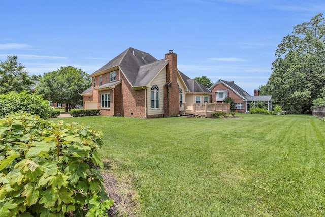 8013 Rosemere Way, Chattanooga, TN 37421 - rear view of house featuring a lawn, brick siding, a deck, and a chimney