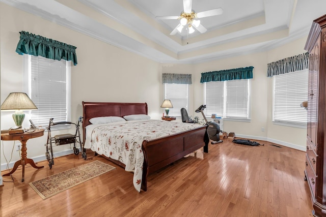 8013 Rosemere Way, Chattanooga, TN 37421 - bedroom featuring a tray ceiling, light wood-type flooring, crown molding, and a ceiling fan