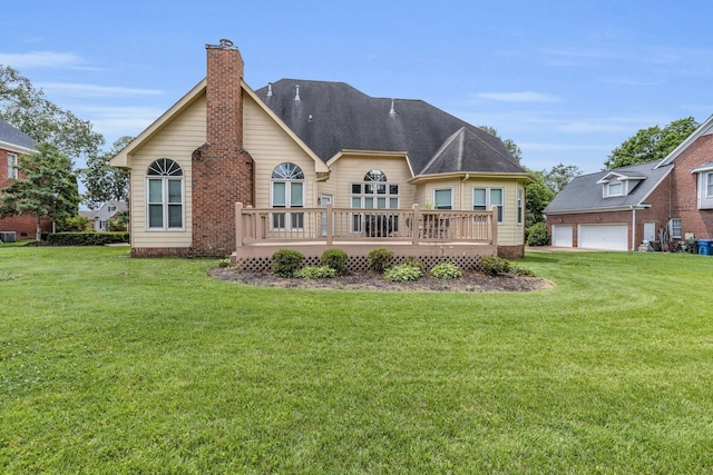 8013 Rosemere Way, Chattanooga, TN 37421 - back of house featuring a wooden deck, a chimney, a yard, a garage, and roof with shingles