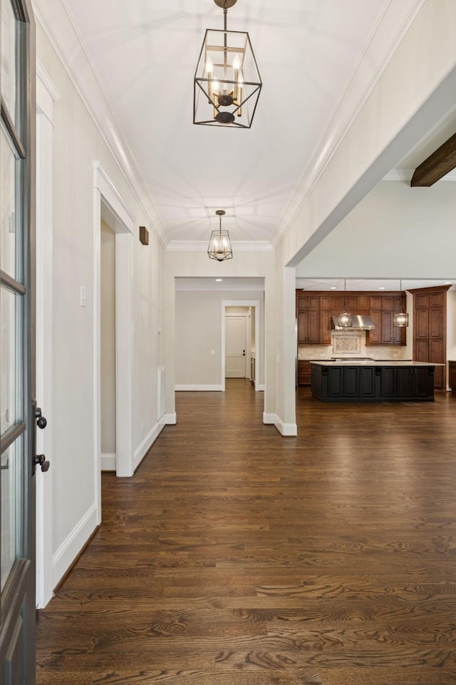 703 Welsh Ln, Franklin, TN 37064 - entryway with a chandelier, dark wood-style floors, and crown molding