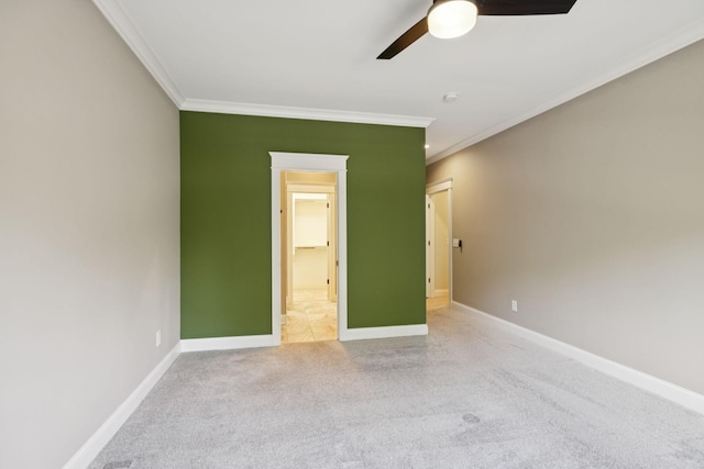 703 Welsh Ln, Franklin, TN 37064 - unfurnished bedroom featuring crown molding, light colored carpet, a ceiling fan, and ensuite bath