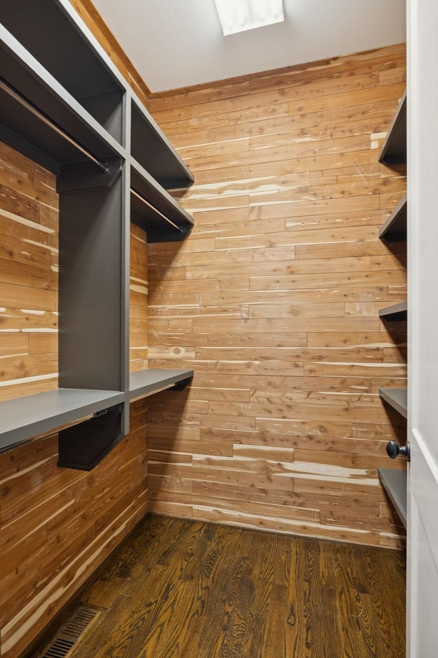 703 Welsh Ln, Franklin, TN 37064 - walk in closet with dark wood-style flooring