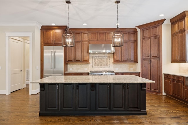 703 Welsh Ln, Franklin, TN 37064 - kitchen featuring built in fridge, wall chimney exhaust hood, a large island, recessed lighting, and backsplash