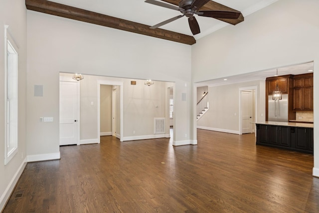 703 Welsh Ln, Franklin, TN 37064 - unfurnished living room featuring a towering ceiling, a ceiling fan, beam ceiling, stairway, and dark wood finished floors