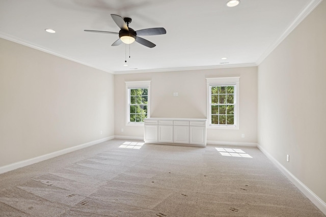 703 Welsh Ln, Franklin, TN 37064 - unfurnished room featuring ornamental molding, healthy amount of natural light, light colored carpet, ceiling fan, and recessed lighting