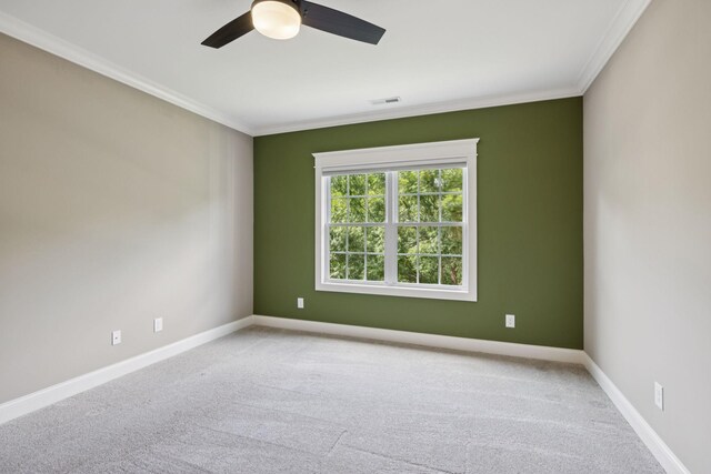 703 Welsh Ln, Franklin, TN 37064 - unfurnished room with ornamental molding, ceiling fan, and carpet