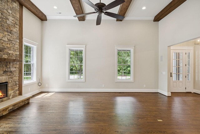 703 Welsh Ln, Franklin, TN 37064 - unfurnished living room featuring dark wood finished floors, beam ceiling, a stone fireplace, recessed lighting, and ceiling fan