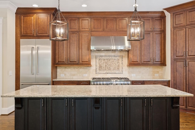 703 Welsh Ln, Franklin, TN 37064 - kitchen with wall chimney range hood, dark wood-style flooring, stainless steel built in fridge, tasteful backsplash, and recessed lighting