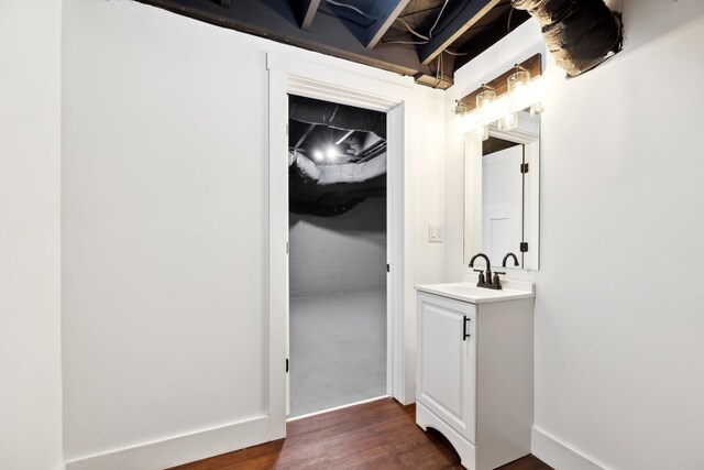 222 Groh St, Lawrenceburg, TN 38464 - bathroom with vanity and wood finished floors