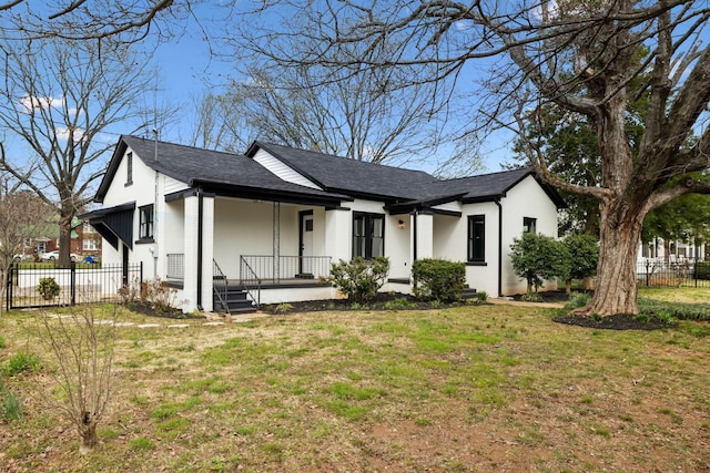 222 Groh St, Lawrenceburg, TN 38464 - view of front of property with covered porch, roof with shingles, and stucco siding