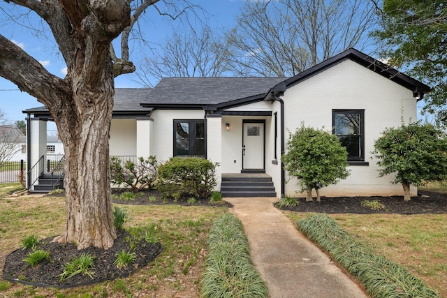 222 Groh St, Lawrenceburg, TN 38464 - view of front of home with roof with shingles, brick siding, and a front lawn