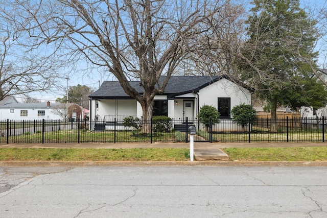 222 Groh St, Lawrenceburg, TN 38464 - view of front of house with stucco siding and a shingled roof