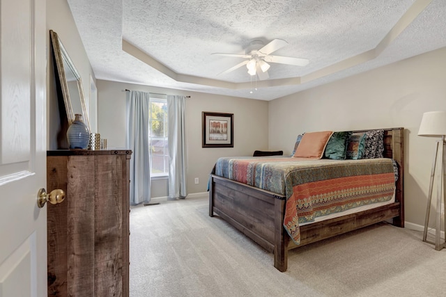 109 New Haven Ct, Nashville, TN 37214 - bedroom with a textured ceiling, a raised ceiling, light carpet, and ceiling fan