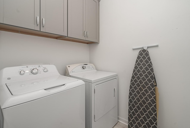 3716 Capstone Dr, Murfreesboro, TN 37128 - laundry area with washing machine and clothes dryer and cabinet space