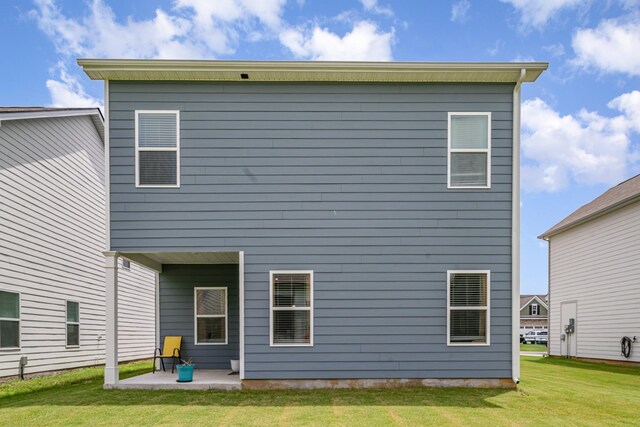 3716 Capstone Dr, Murfreesboro, TN 37128 - rear view of house with a lawn and a patio area
