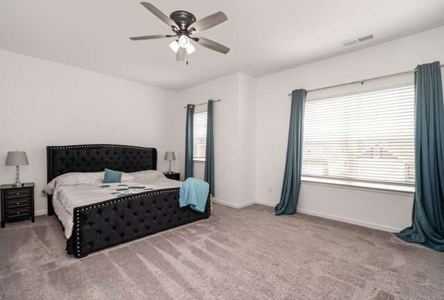 3716 Capstone Dr, Murfreesboro, TN 37128 - carpeted bedroom featuring baseboards and a ceiling fan