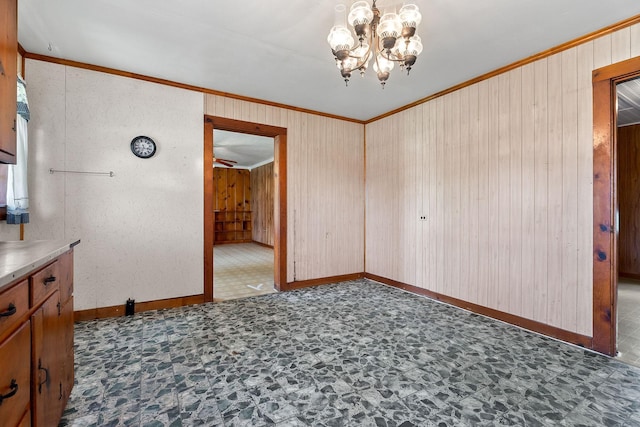 75 Lakeside Dr, Rock Island, TN 38581 - unfurnished dining area with crown molding, a chandelier, and wooden walls