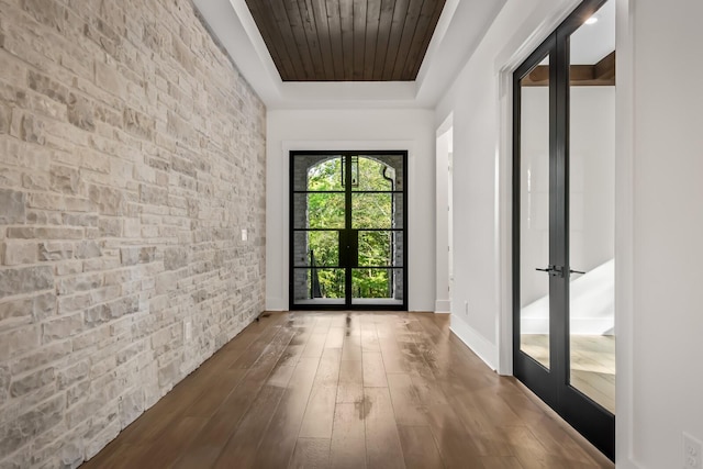 6628 Bethesda Arno Rd, Thompsons Station, TN 37179 - doorway to outside with hardwood / wood-style floors, a tray ceiling, and wood ceiling