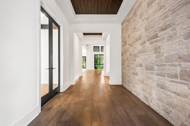 6628 Bethesda Arno Rd, Thompsons Station, TN 37179 - corridor with a tray ceiling, dark wood finished floors, and french doors