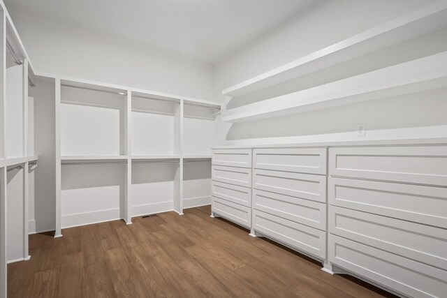 6628 Bethesda Arno Rd, Thompsons Station, TN 37179 - spacious closet featuring dark wood-style floors