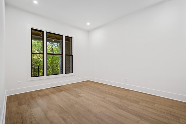 6628 Bethesda Arno Rd, Thompsons Station, TN 37179 - empty room featuring light wood-type flooring and recessed lighting